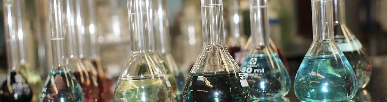 Laboratory glassware with chemical solutions